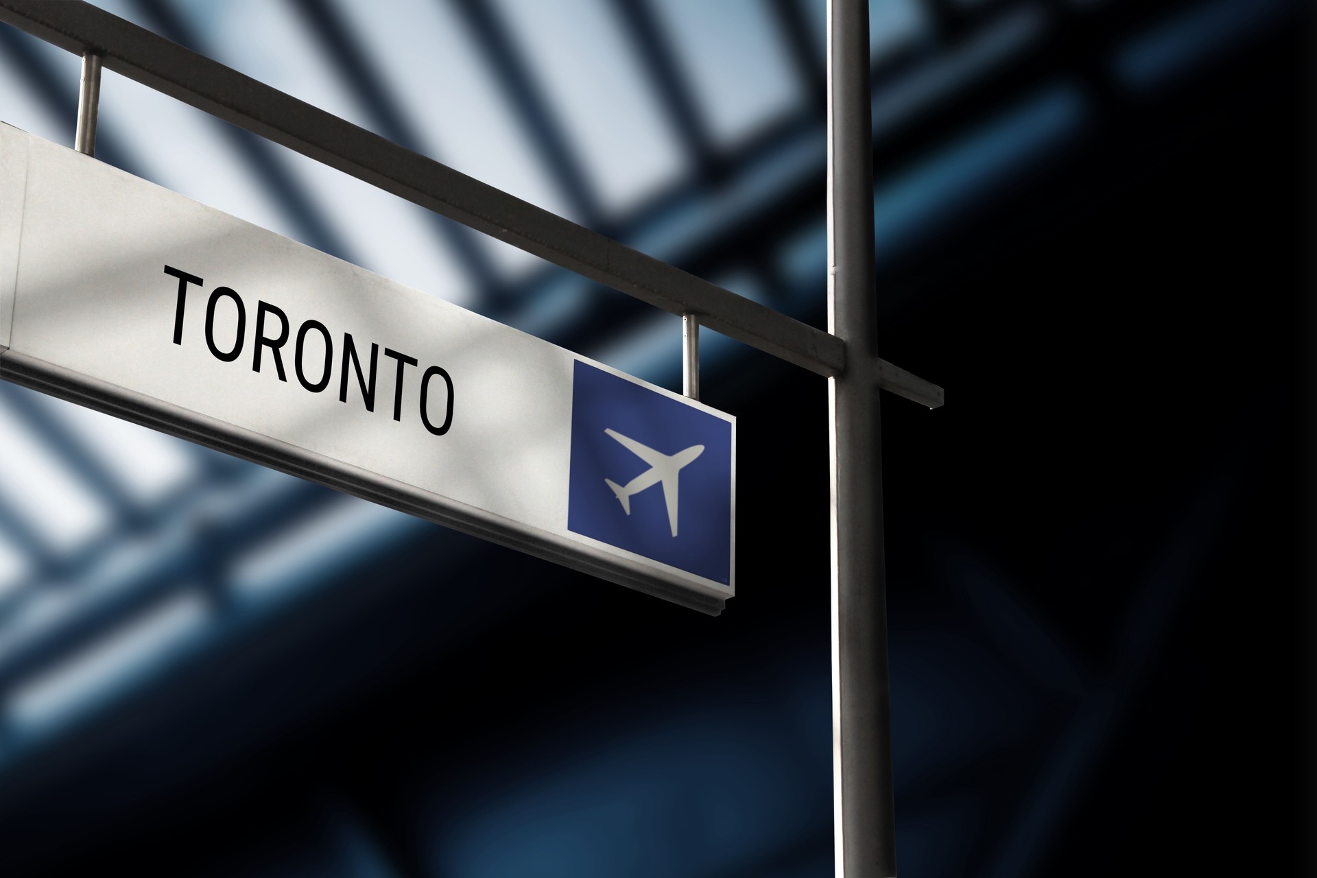Airport departure for Toronto information board sign